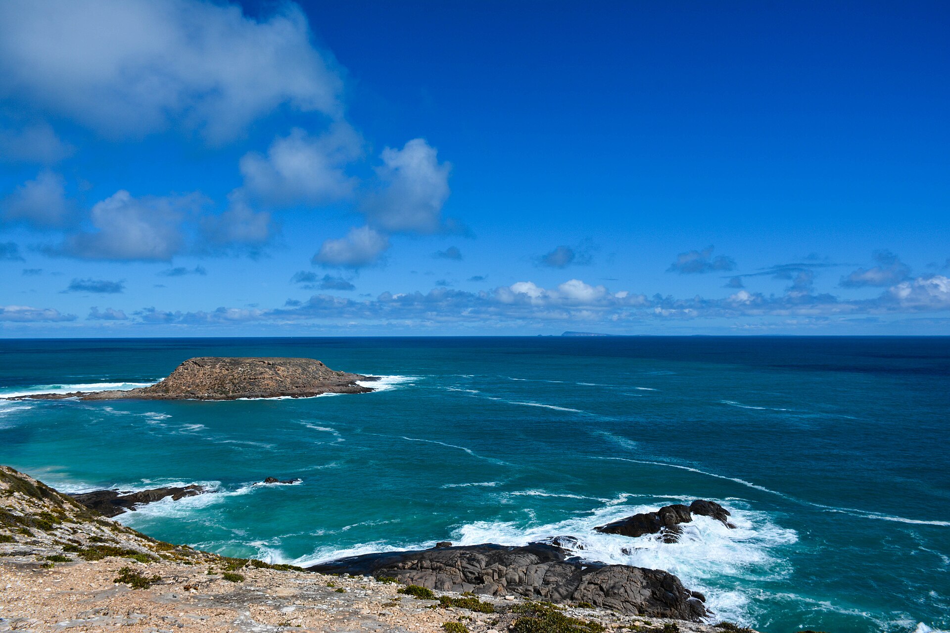Looking west from Royston Head towards the small Royston Island, Innes National Park, Yorke Peninsula, South Australia. Wedge Island is visible on the horizon.